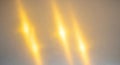 Dynamic Golden Light Streaks on Textured Gray Surface with Subtle Scratches Royalty Free Stock Photo