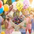 Exploding Gift Box Surprise with Colorful Confetti and Streamers in Mid Air Royalty Free Stock Photo