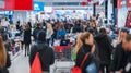 This dynamic image captures the bustling atmosphere of a modern retail store on Black Friday. Generative AI
