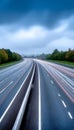 Dynamic Long Exposure of Highway Motion Blur with Light Trails Beneath Overcast Clouds at Night Royalty Free Stock Photo
