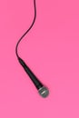 Dynamic microphone on pink background. Mic Royalty Free Stock Photo