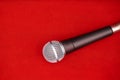 Dynamic microphone on red floor for music Royalty Free Stock Photo