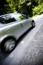 Dynamic motion blur of close car passing