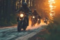 Dynamic motorcycle squad speeds along a forested road, creating excitement