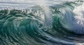 A dynamic ocean wave captured mid-crest, Royalty Free Stock Photo