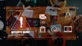 Security Alert Visualization in a Modern Office Setting with People Discussing Data Privacy Measures and Cybersecurity Royalty Free Stock Photo