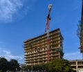 Active Construction of a Multi-Story Building with a Tower Crane. Construction Site in the City. Royalty Free Stock Photo