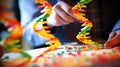 Scientist working on a DNA double helix model in a laboratory Royalty Free Stock Photo