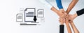 Collaborative Workplace Team Effort with Hands Reaching for Downloading Documents in a Business Environment Trope Royalty Free Stock Photo