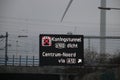 Dynamic route information panel warns for closed tunnel named Koningstunnel on S100 in The Hague on highway A4.
