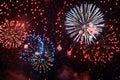 A dynamic scene of red, white, and blue fireworks bursting in the dark sky, A patriotic display of red, white, and blue fireworks Royalty Free Stock Photo