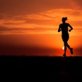 Running into the Sunrise - A Symbol of Endurance and Determination