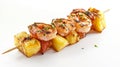 a dynamic side view of a skewer of grilled shrimp and pineapple