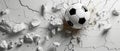 Dynamic soccer ball crashing through a white wall, creating an explosion of debris and cracks in the surface, symbolizing power Royalty Free Stock Photo