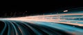 Dynamic spark trails captured in high speed photography against a black background