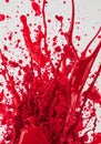 Dynamic splash of bright red liquid, creating an abstract and energetic composition Royalty Free Stock Photo