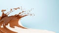 A dynamic splash of liquid milk and melted chocolate is formed mid-air, creating a crown shape set against a vibrant blue backdrop Royalty Free Stock Photo