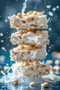 Dynamic Splash Surrounding Stack of White Chocolate and Peanut Bars on Blue Background
