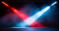 Dynamic stage lighting with red and blue beams illuminating smoke filled atmosphere Royalty Free Stock Photo