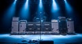 Rock concert stage setup with multiple amplifier stacks and drum kit, bathed in blue light Royalty Free Stock Photo