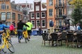 A dynamic street scene with yellow bikes