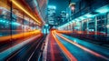 A dynamic and vibrant cityscape at night, with long exposure light trails illuminating the scene, showcasing the constant motion Royalty Free Stock Photo