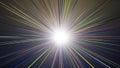 Bright light burst with colorful rays emanating from the center on a dark background Royalty Free Stock Photo