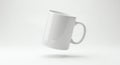 Dynamic White Ceramic Mug Mockup Floating Tilted on a Clean Minimalist Gradient Background with Subtle Shadow Royalty Free Stock Photo