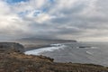 Dyrholaey Area in Iceland. Close to Black Sand Beach. Sunrise. Cloudy Sky. Wide Angle. Royalty Free Stock Photo