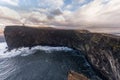 Dyrholaey Area in Iceland. Close to Black Sand Beach. Sunrise. Lighthouse in Background.