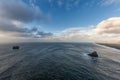 Dyrholaey Area in Iceland. Close to Black Sand Beach. Sunrise. Rocks in Water