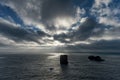 Dyrholaey Area in Iceland. Close to Black Sand Beach. Sunrise. Sunlight. Cloudy Sky Royalty Free Stock Photo