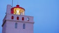 Dyrholaey lighthouse tower on shore