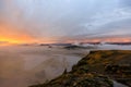 Amazing landscape with basalt rock formations Troll toes (Trolls fingers) on Black Beach. Ocean waves flow around stones. Midnight Royalty Free Stock Photo