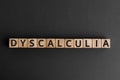 Dyscalculia - word from wooden blocks with letters