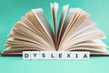 Dyslexia and read words with an open book Royalty Free Stock Photo