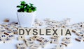 Dyslexia word formed with wooden blocks. Reading difficulties concept