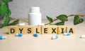 Dyslexia Word Written In Wooden Cube, medical concept Royalty Free Stock Photo