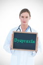 Dyspraxia against doctor showing chalkboard Royalty Free Stock Photo