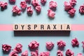 Dyspraxia word concept on cubes Royalty Free Stock Photo