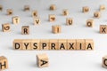 Dyspraxia - word from wooden blocks with letters