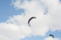Dzerzhinsk, Nizhny Novgorod region, Russia, 03.21.2021 Speedriding skiing with a wing over your head. Spring blue sky gusty wind s