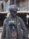 Dzerzhinsk, Ukraine - August 20, 2013: Miner working on a jackhammer from the Dzerzhinsky mine after work