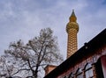 Dzhumaya Mosque and its minaret extends during overcast weather. Royalty Free Stock Photo