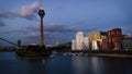 Dusseldorf, Germany - Rhine River, TV Tower and the Iconic Harbor Buildings. Evening View.