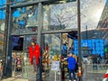 Modern glass facade with store entrance to nuts factory shop Royalty Free Stock Photo