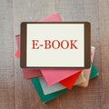 E-book library concept with digital tablet and books Royalty Free Stock Photo