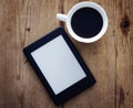 E-book reader and coffee Royalty Free Stock Photo