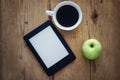 E-book reader and coffee Royalty Free Stock Photo