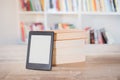 E-book reader on a stack of books Royalty Free Stock Photo